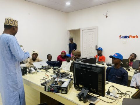 A SkillsPark learner practising computer maintenance and troubleshooting.