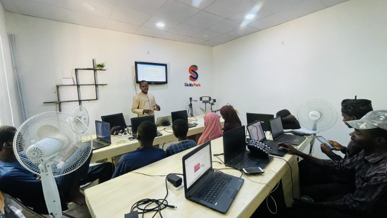 SkillsPark learners building computer confidence through practical graphic design.